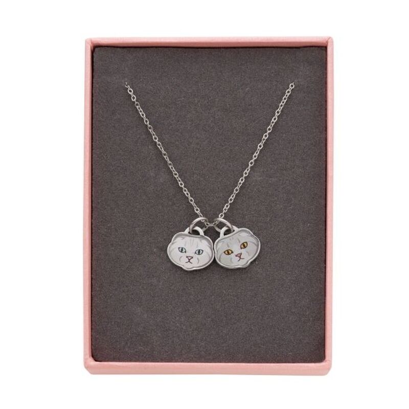 A necklace of Olivia and Meredith Swift, Taylor Swift's cats.
