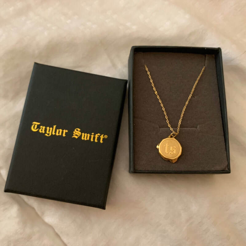 Wax seal necklace for Taylor Swift.